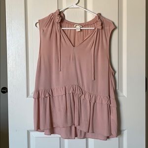 Sleeveless pink blouse